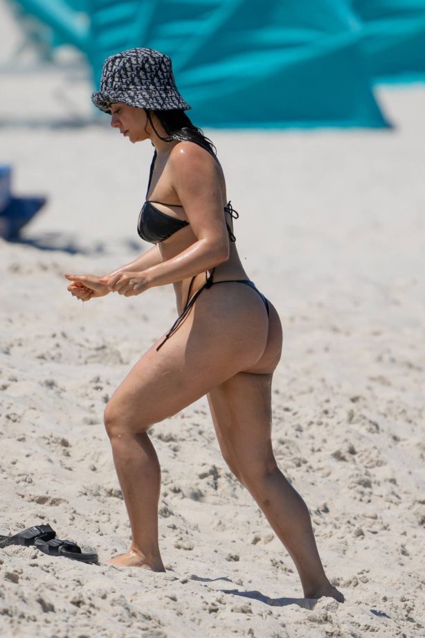 Emeraude Toubia - In a bikini at the beach in Miami