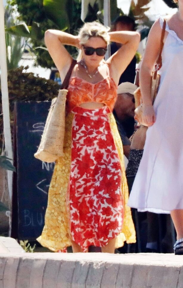Emily Atack - In orange floral maxi dress wit her mother Kate Robbins on holiday in Marbella