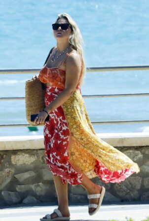 Emily Atack - In orange floral maxi dress wit her mother Kate Robbins on ho...