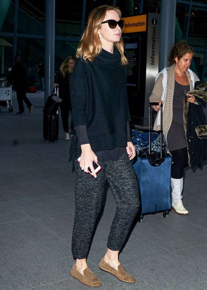 Emily Blunt - Arrives at Heathrow Airport in London