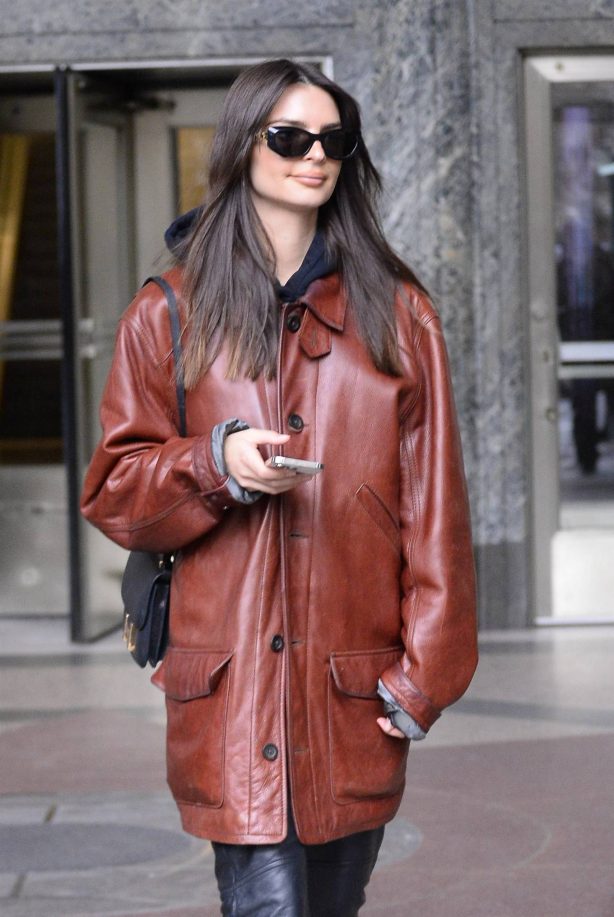 Emily Ratajkowski - In a brown leather jacket while exiting her podcast taping in New York