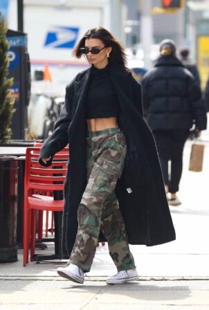 Emily Ratajkowski - Out in camo pants and a black trench coat in New York