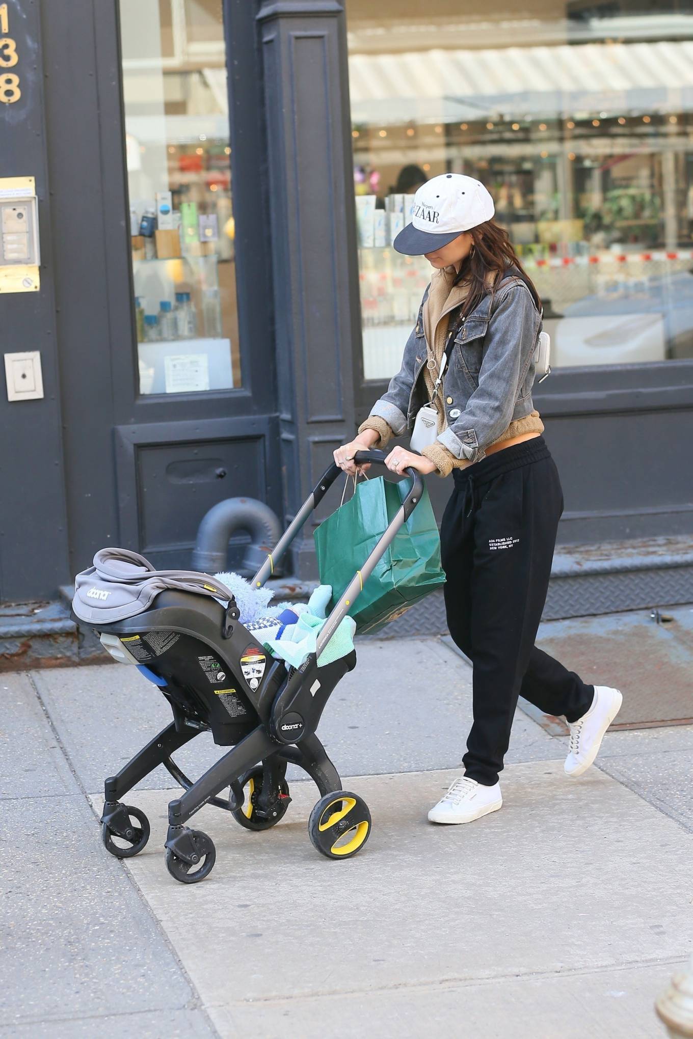 Emily Ratajkowski – Seen on a stroll with her baby