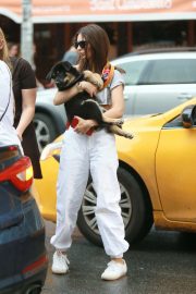 Emily Ratajkowski - Spotted with her dog whaile leaving Sant Ambroeus in NYC