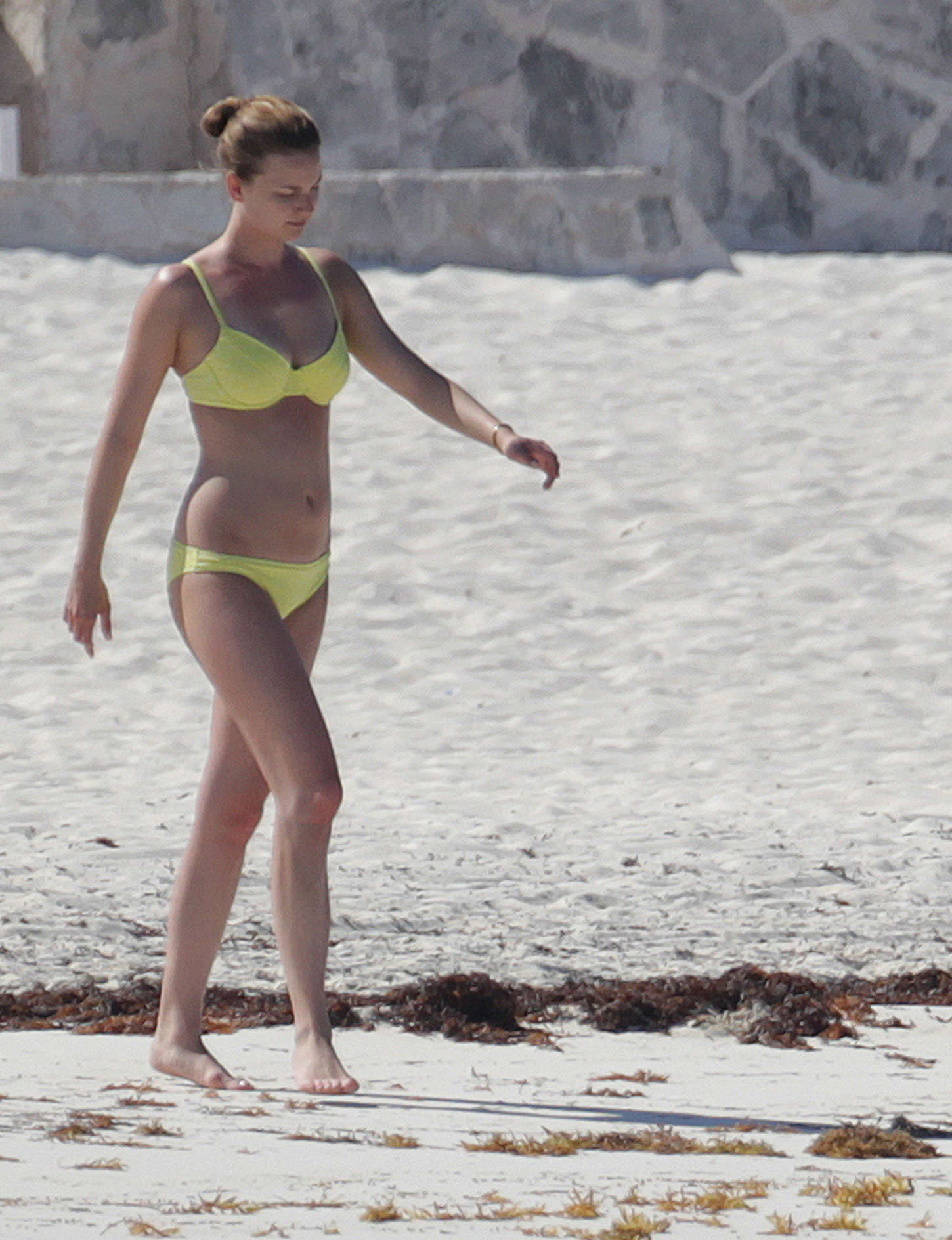 Emily VanCamp in Bikini on the beach in Cancun. 