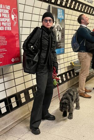 Emma Corrin - Seen at Leicester Square Tube Station with her dog Spencer