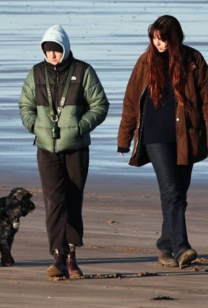 Emma Corrin - Seen on a beach dog walk with a friend in Kent
