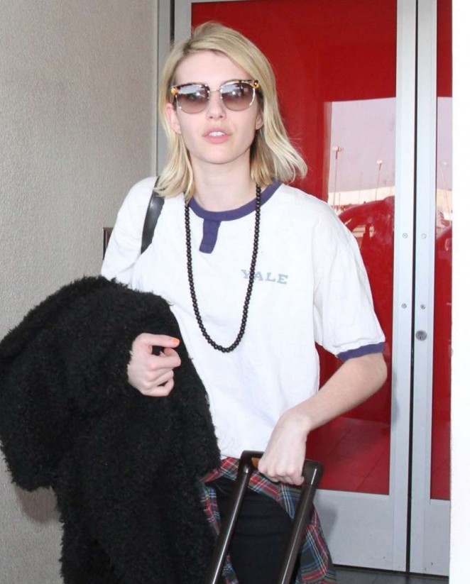 Emma Roberts - Arrives at Los Angeles International Airport