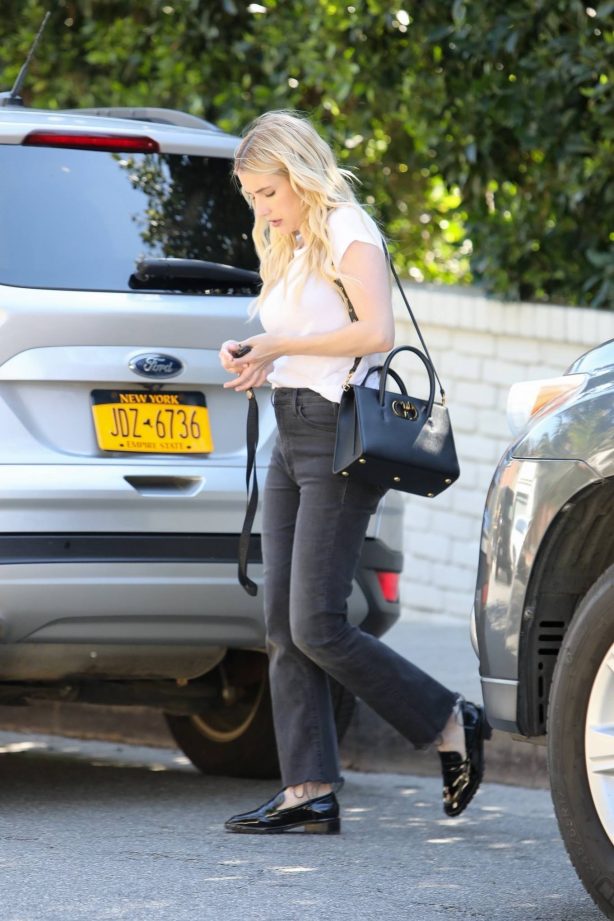 Emma Roberts - In black jeans and a white tee doing photoshoot in Los Angeles