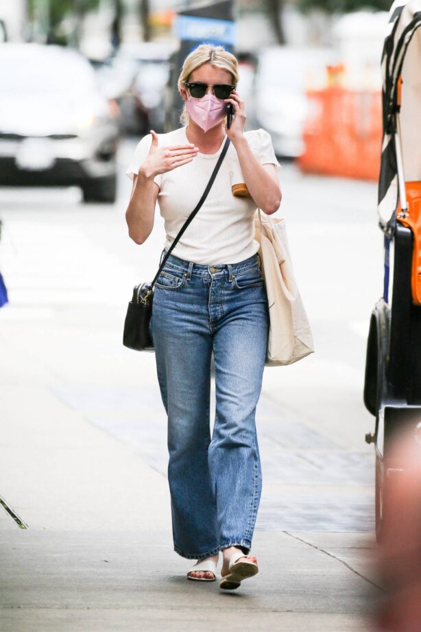 Emma Roberts - In denim pants walking around in New York