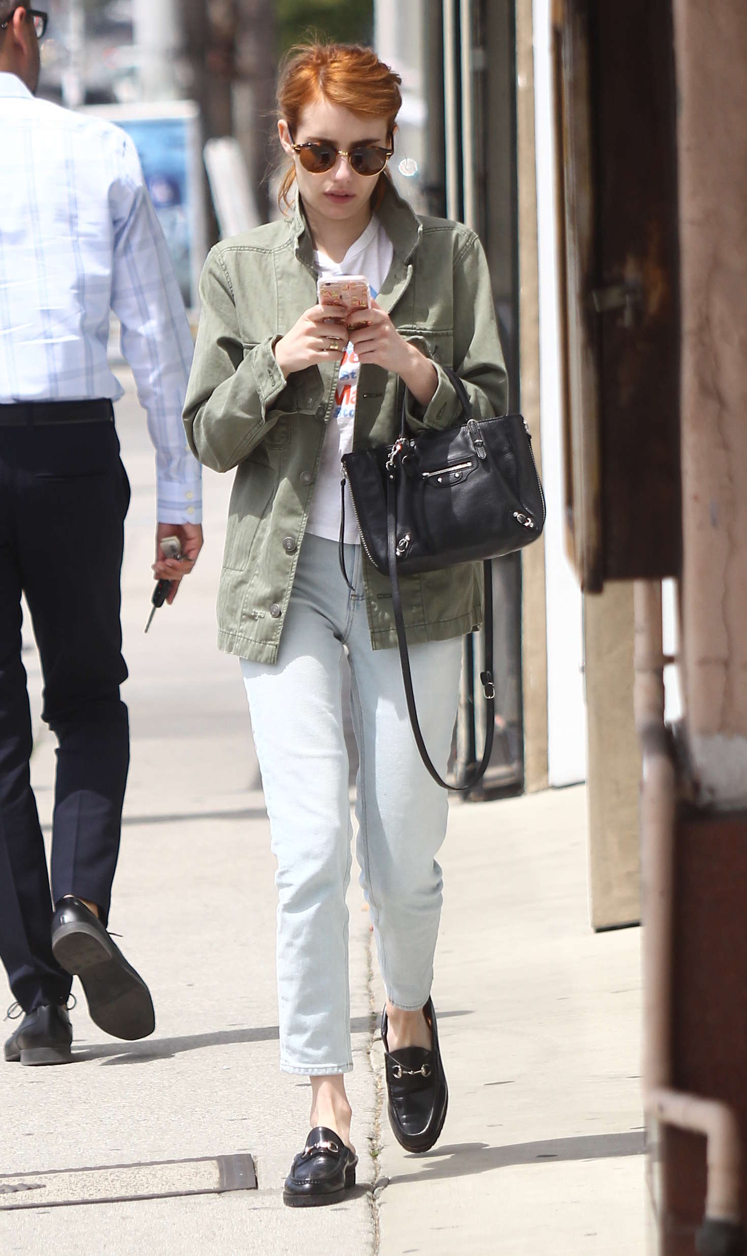 Emma Roberts in White Jeans -01 | GotCeleb