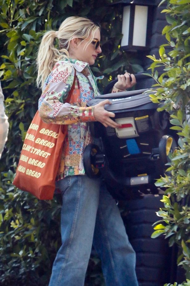 Emma Roberts - Out with her newborn baby boy Rhodes in Los Angeles