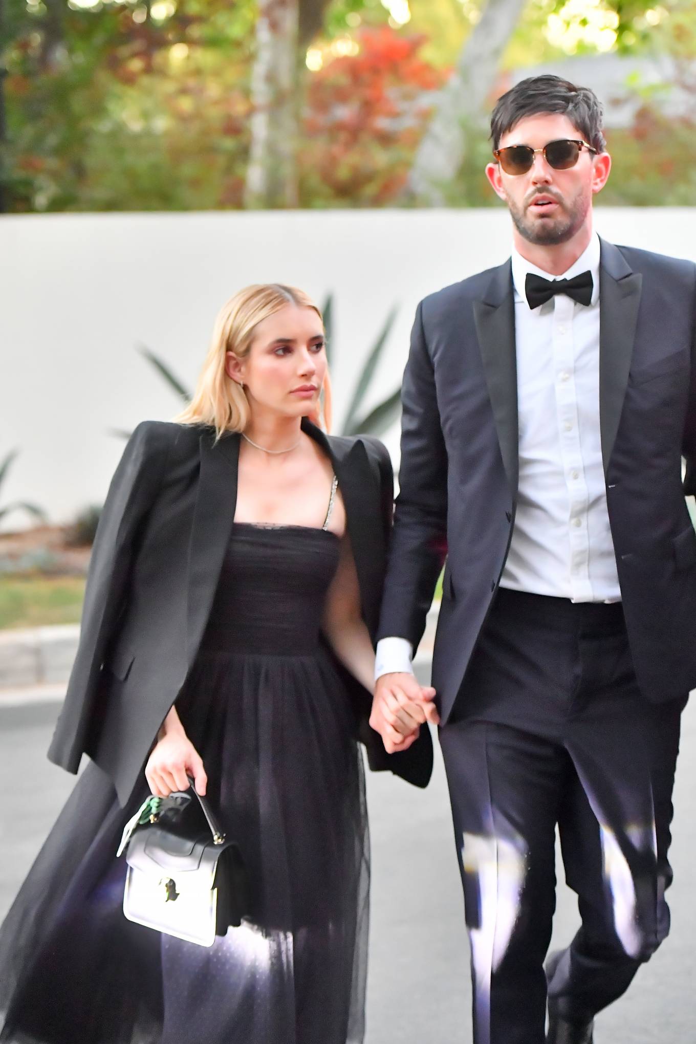 Emma Roberts - Seen arriving and exiting Paris Hilton's Wedding in Beverly Hills