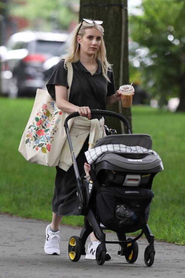Emma Roberts - Seen with baby Rhodes in Boston
