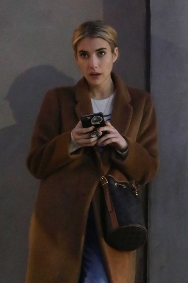 Emma Roberts - Waiting for her car in Los Angeles