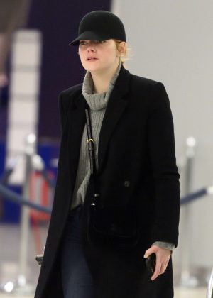 Emma Stone - Arrives at JFK airport in NYC