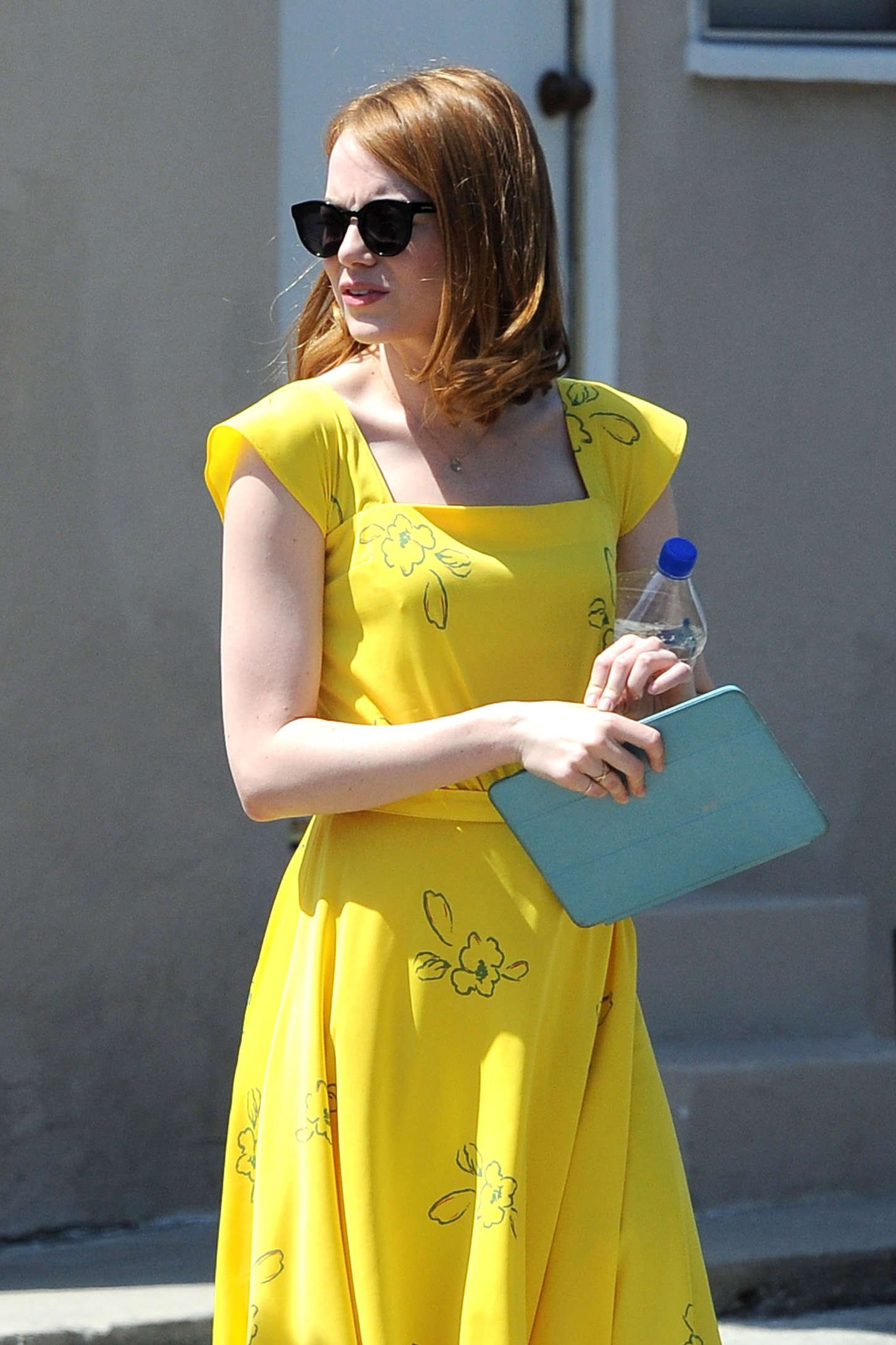 Emma Stone in Yellow Dress on La La Land set -15 | GotCeleb