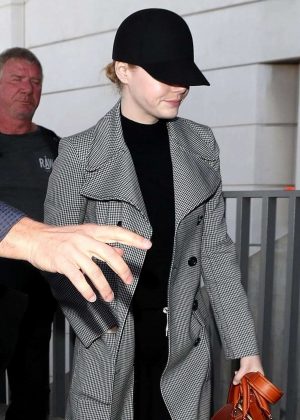 Emma Stone in Long Coat at LAX Airport in Los Angeles
