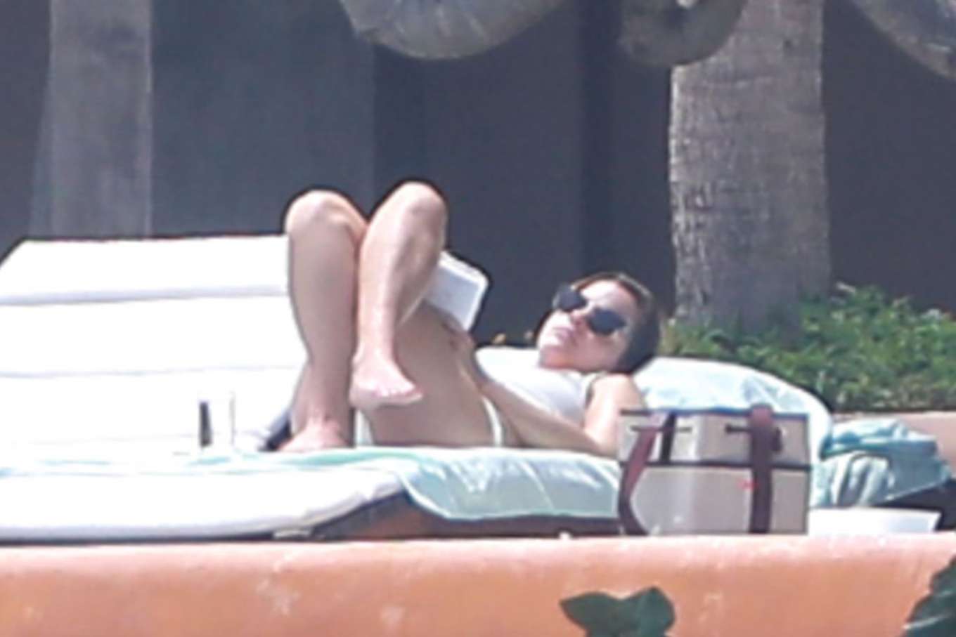 Emma Watson in White Bikini on the pool in Cabo San Lucas