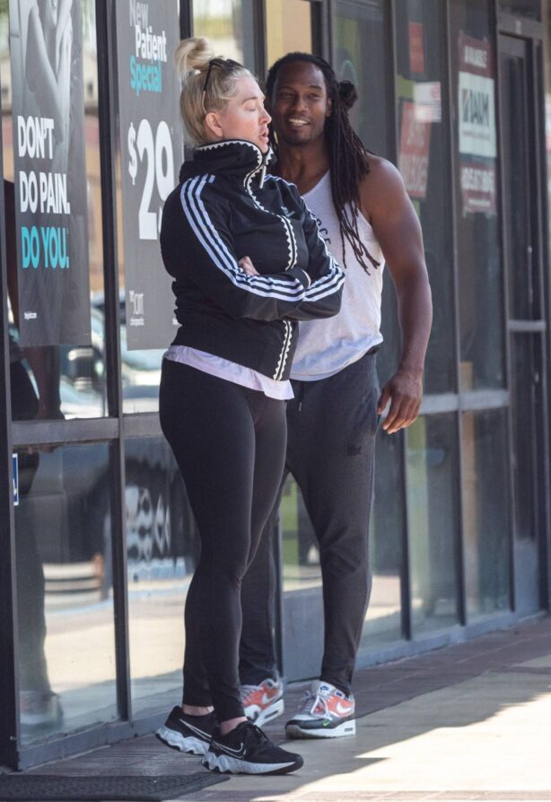 Erika Jayne - Seen with her kickboxing trainer after workout in Los Angeles
