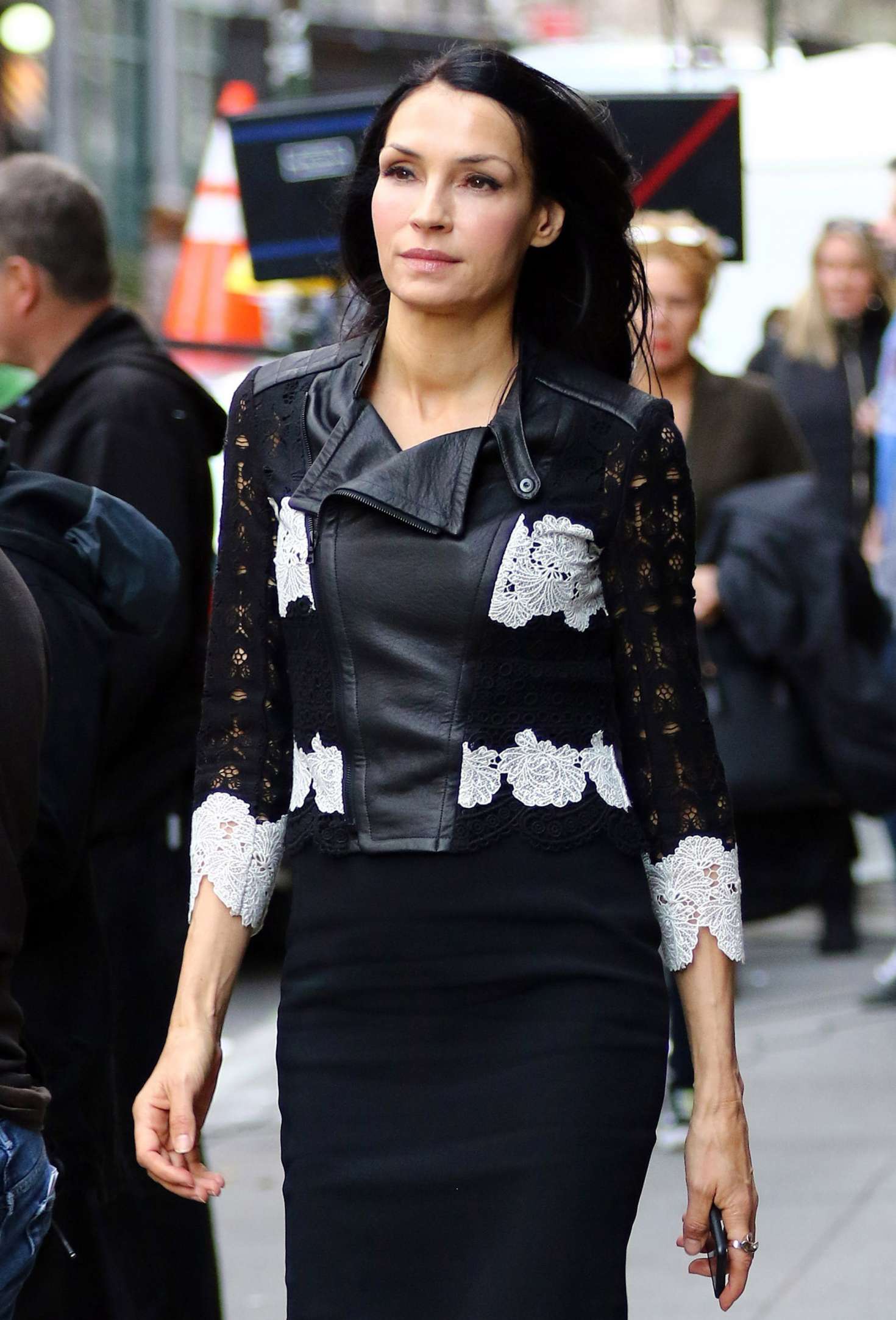 Famke Janssen in a tight black dress in New York