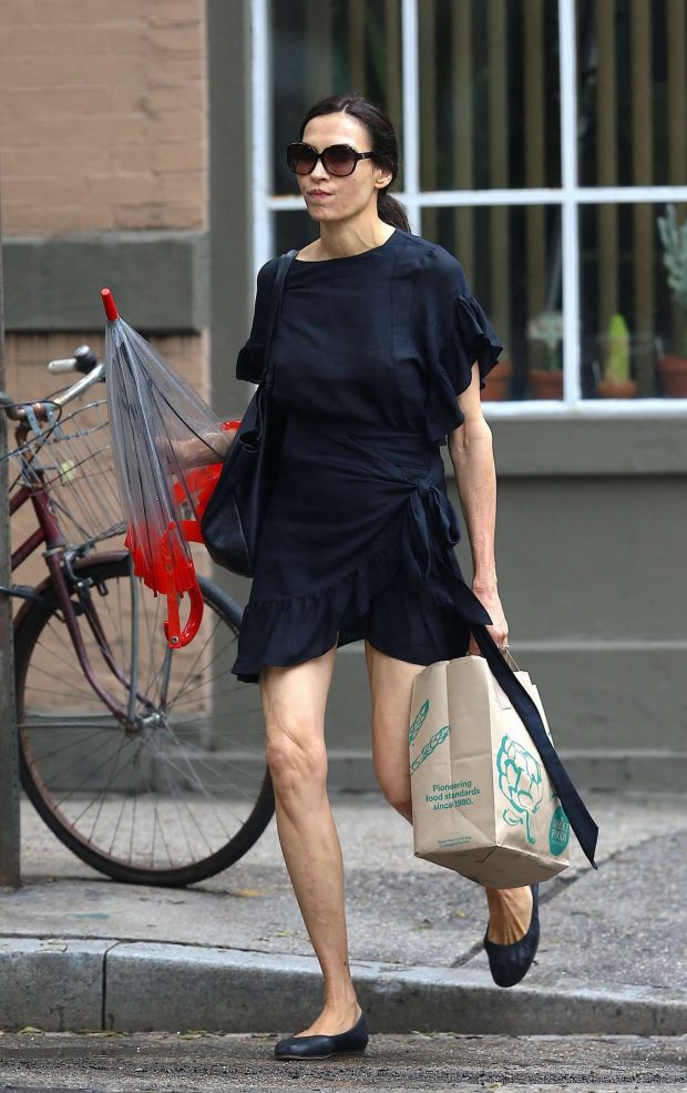 Famke Janssen in Black Mini Dress - Out in New York