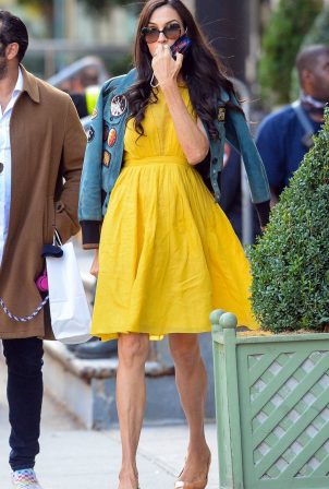 Famke Janssen - Out in a yellow dress with friends in downtown Manhattan