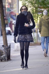 Famke Janssen - Wears gloves and a scarf while running errands in NYC