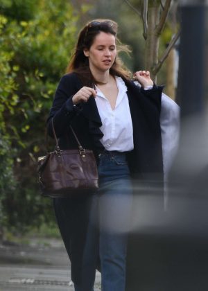 Felicity Jones heads for a photoshoot at a studio in London