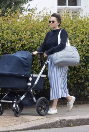 Felicity Jones - Takes her newborn for a stroll in London