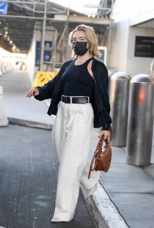 Florence Pugh - Is spotted as she touches down in Los Angeles