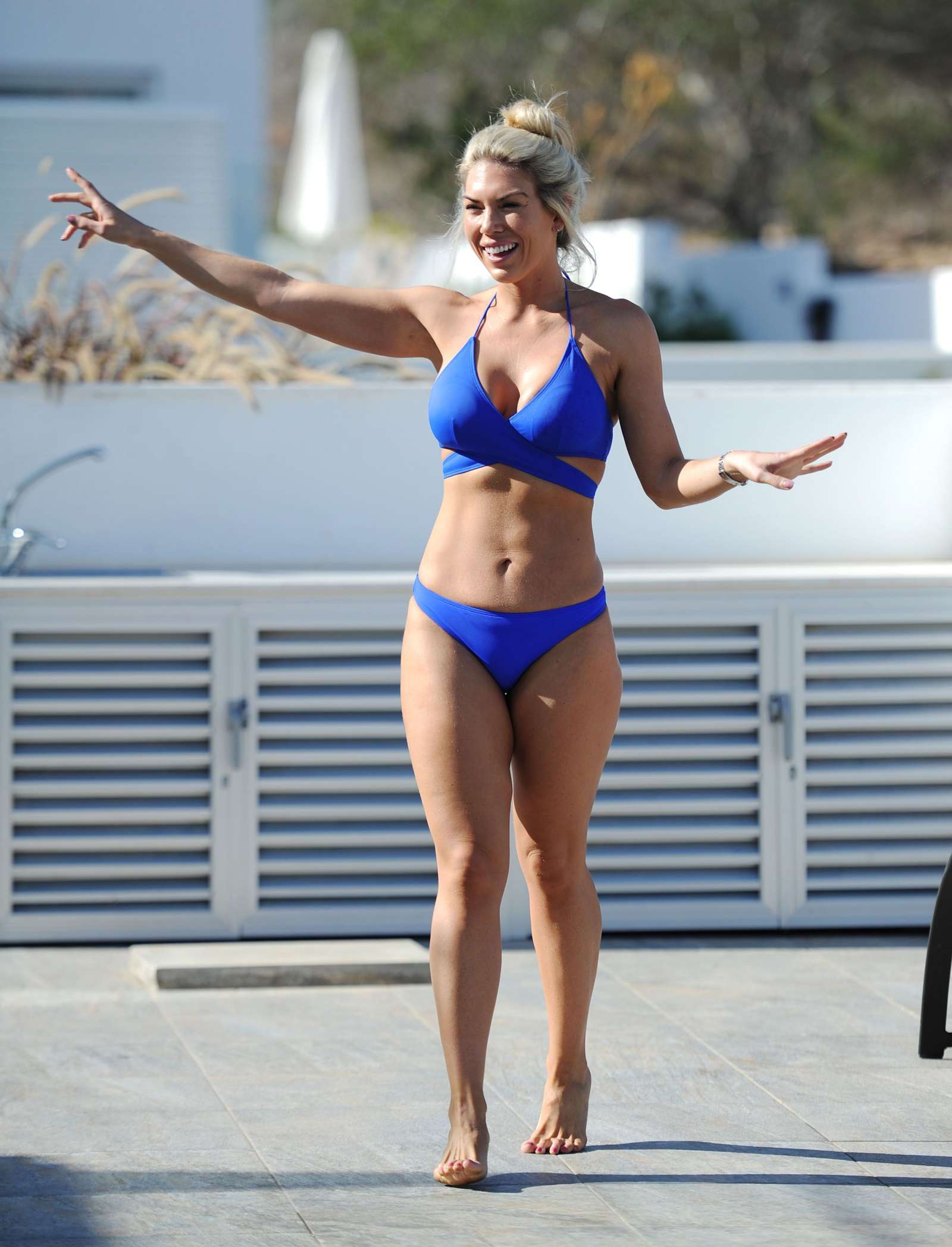 Frankie Essex in Blue Bikini at a pool in Mykonos. 