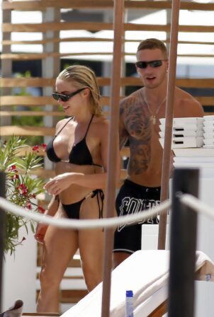 Gabby Allen - In a black bikini by the pool at Nobu Hotel in Ibiza