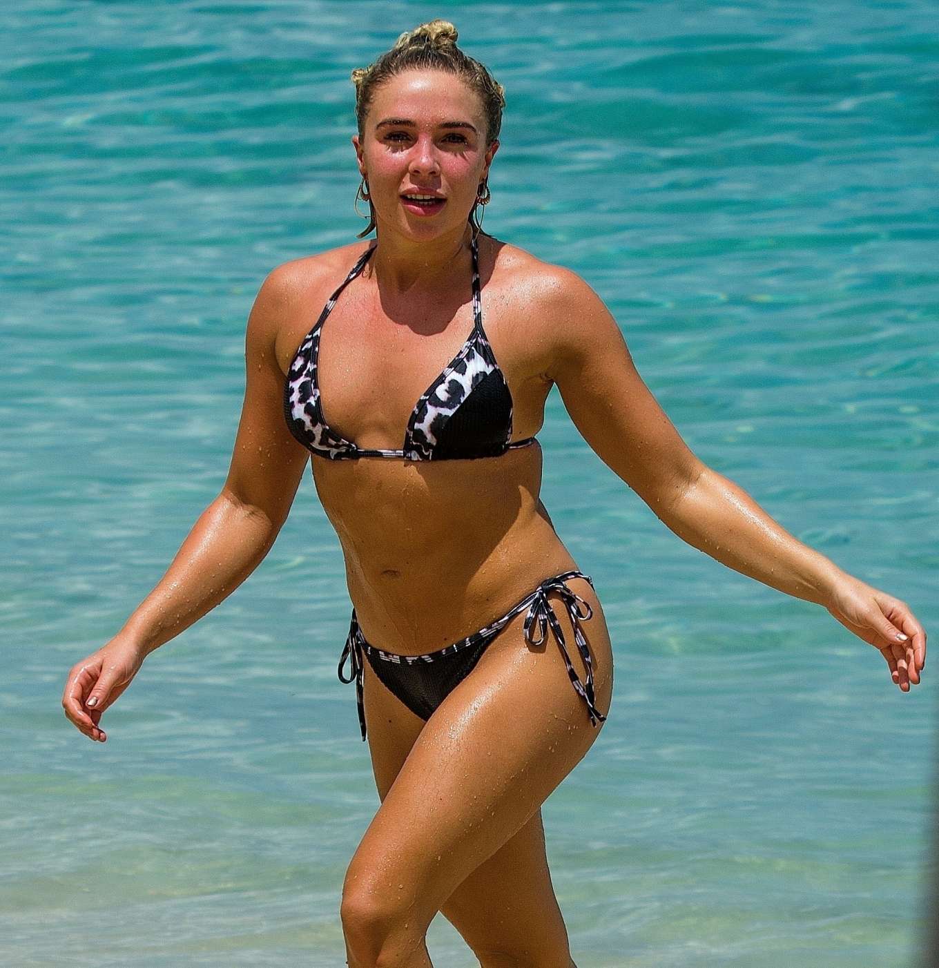 Gabby Allen in Bikini on the beach in Barbados. 