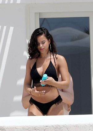 Georgia May Foote in Black Bikini on the pool in Mykonos