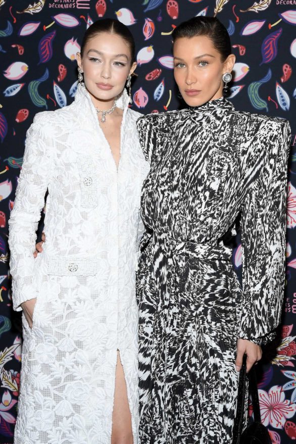 Gigi and Bella Hadid - Harper's Bazaar Exhibition at 2020 Paris Fashion Week