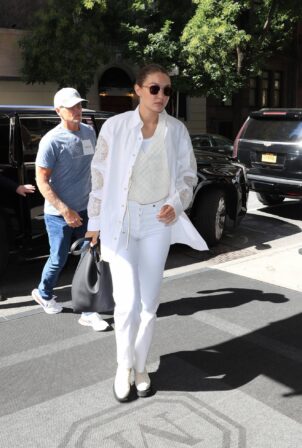Gigi Hadid - In an all-white ensemble as she steps out during New York Fashion Week