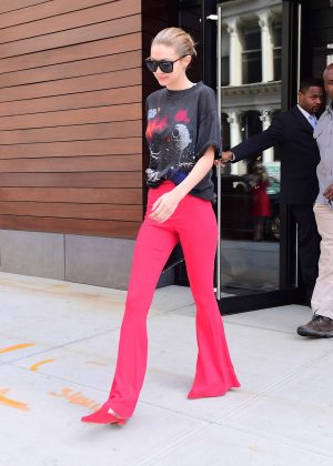 Gigi Hadid in red pants out in NYC