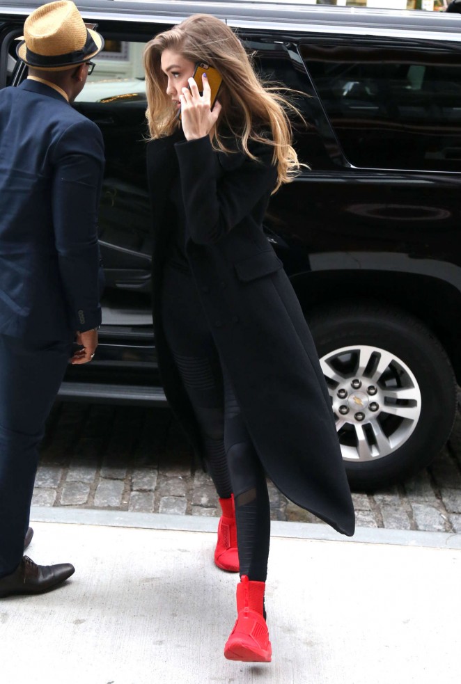 Gigi Hadid in red sneakers out in New York