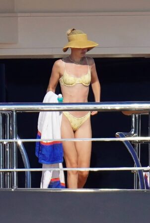 Gigi Hadid - Seen in a yellow bikini on a yacht in the bay of Saint-Tropez