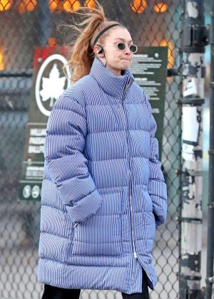 Gigi Hadid - Wearing a Pin Stripe Puffer Jacket in NYC