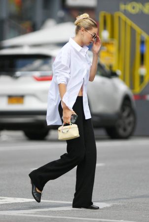 Gigi Hadid - Wearing white shirt as she takes a stroll on the streets of New York