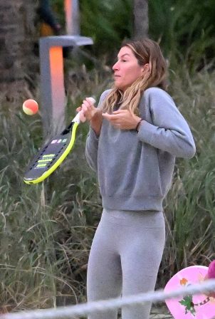 Gisele Bündchen - Seen playing beach tennis in Miami