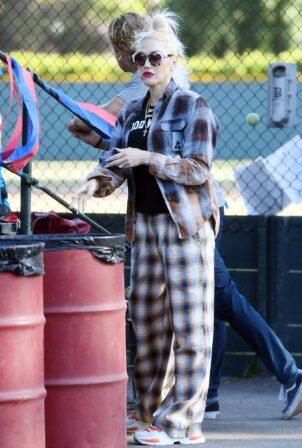 Gwen Stefani - Wears her flannel pajamas to Zuma's baseball game in Los Angeles