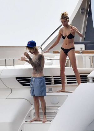Hailey Baldwin in Black Bikini with Justin Bieber at a yacht in Italy