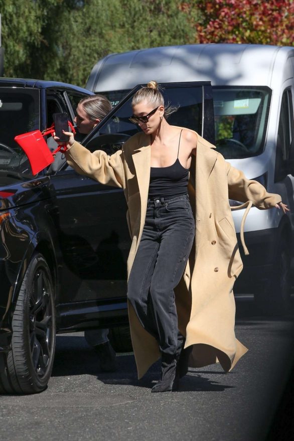 Hailey Bieber almost takes a fall while out with stylist