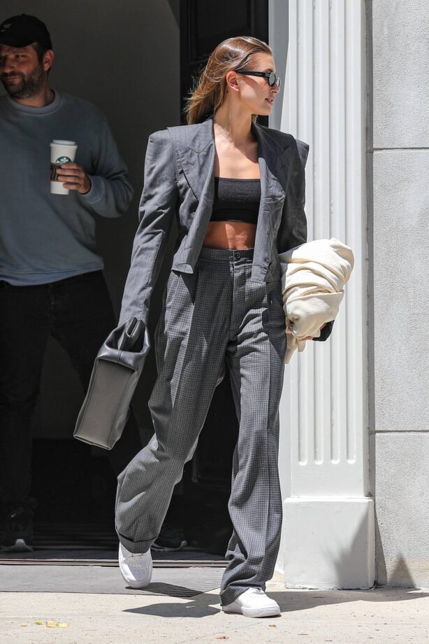 Hailey Bieber - Dons business look as she leaves her office