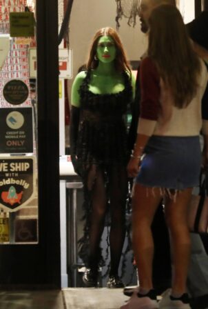 Hailey Bieber - Dresses up as She-Hulk while leaving Prince Street Pizza restaurant