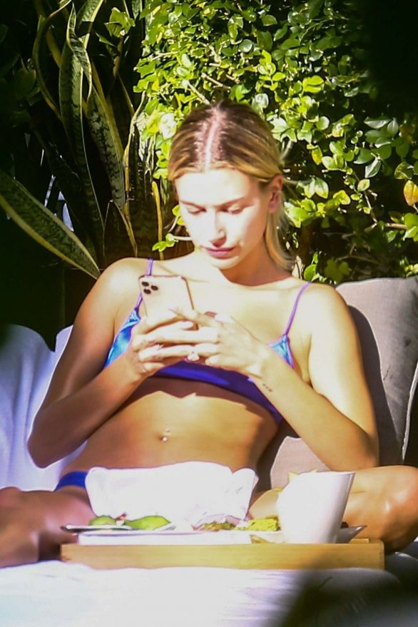 Hailey Bieber in Bikini on the pool in Miami