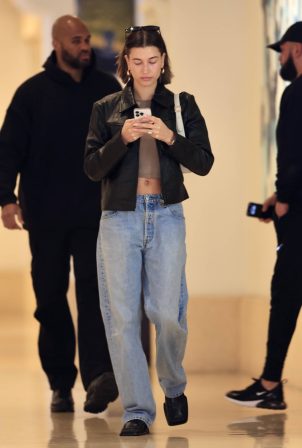 Hailey Bieber - Out in blue jeans and a crop top in Beverly Hills